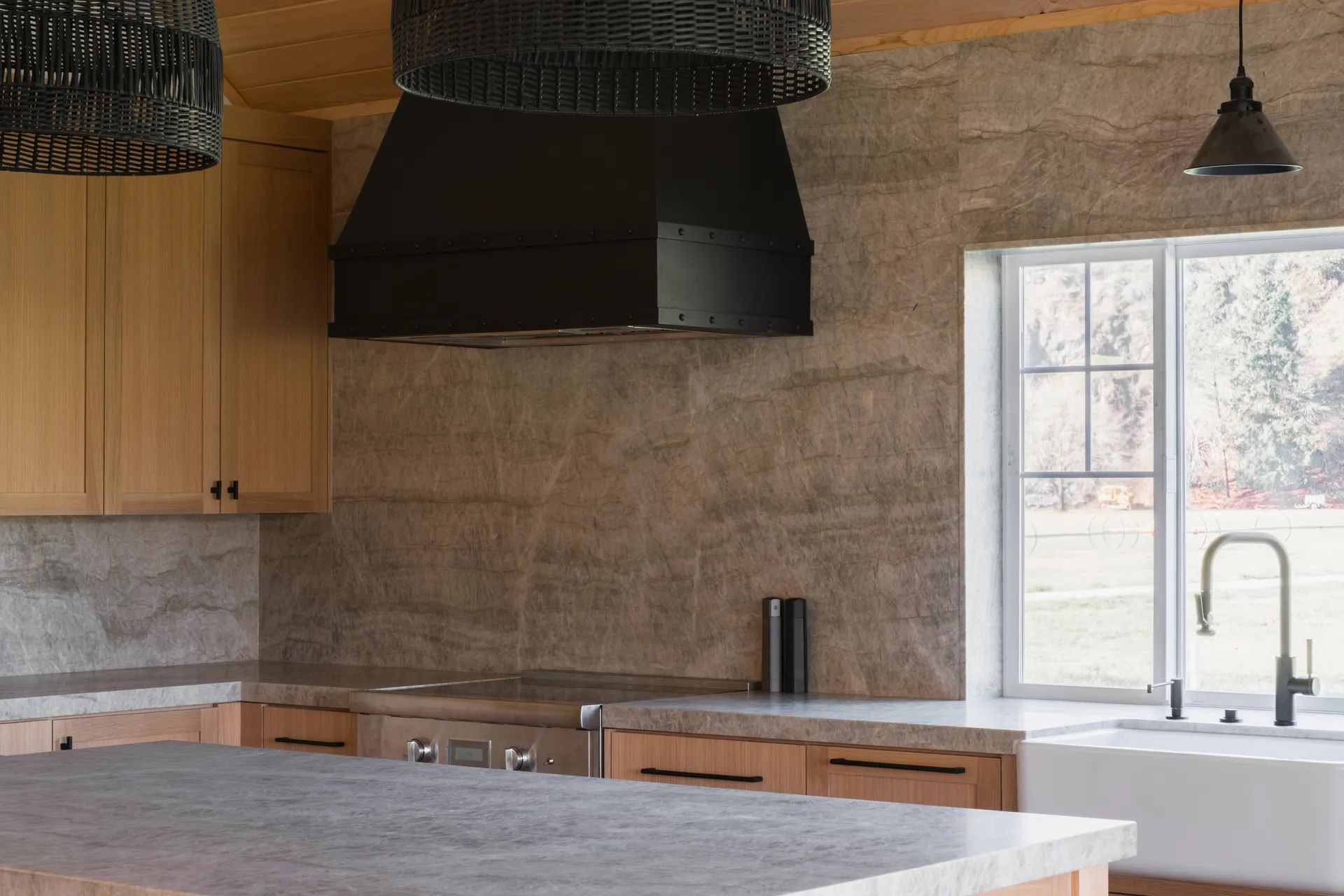 Full-height stone backsplash